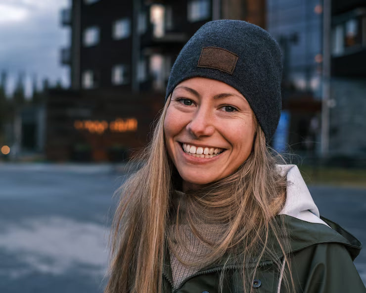 files/portrait-smiling-blonde-caucasian-female-coat-hat-winter_181624-30114.avif